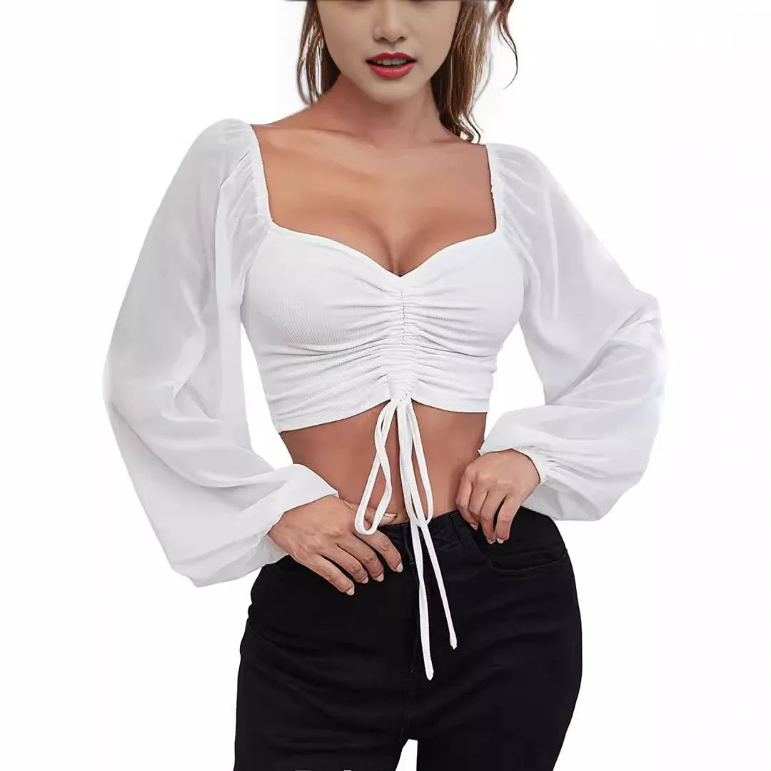 Vrouwelijke croptop met lange mouwen